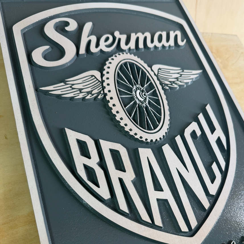CNC-carved hardwood sign